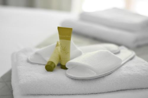 Postel nebo postele na pokoji v ubytování Hotel Argilos