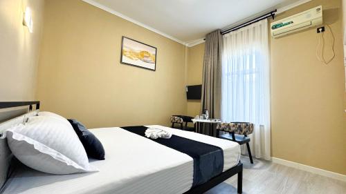 Postel nebo postele na pokoji v ubytování Hotel S & D Hostel