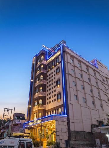 a tall building with blue accents on the side of it at PRIME LAND in Varanasi