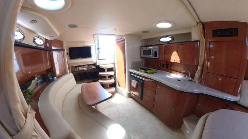 an aerial view of an rv kitchen and living room at Searay 320 in Miami