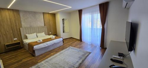 Postel nebo postele na pokoji v ubytování Hotel Pojata