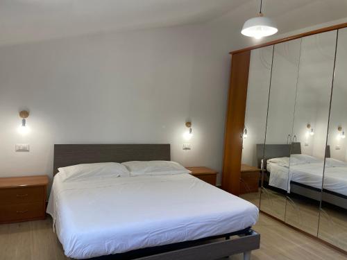 Postel nebo postele na pokoji v ubytování La Petit Maison