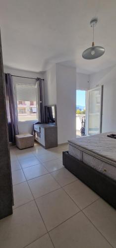 Llit o llits en una habitació de Your Vlora Placee