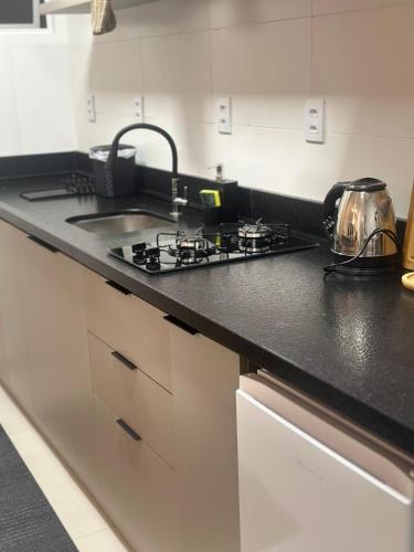 Dapur atau dapur kecil di Studio alto padrão - 5 minutos da UNISC a pé