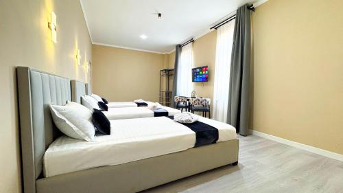 Postel nebo postele na pokoji v ubytování Hotel S & D Hostel