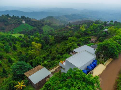 an aerial view of a house in a forest at Maemon villa แม่มอญ วิลล่า in Ban Ri So