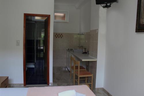 Kuchyň nebo kuchyňský kout v ubytování Apartments Bovan