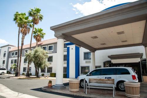 a white suv parked in front of a gas station at Holiday Inn Express Tucson-Airport by IHG in Tucson