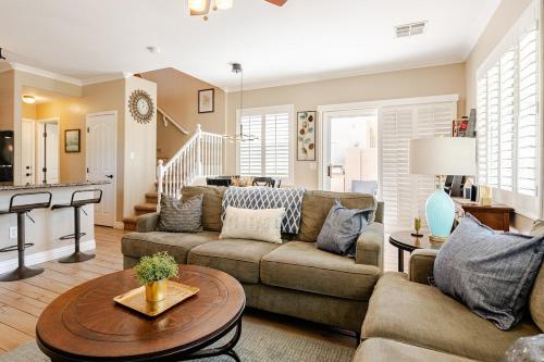 a living room with a couch and a table at Amazing Gilbert home 3 Bed 2 and half Bath sleeps 8 2 car garage in Gilbert