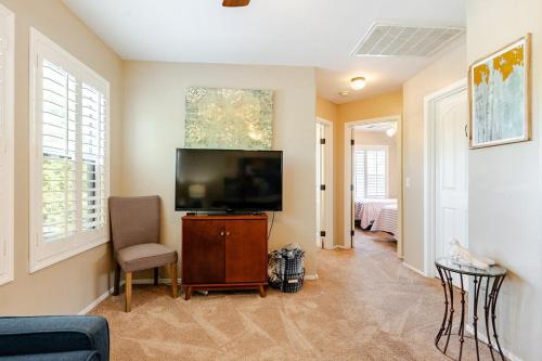 a living room with a flat screen tv at Amazing Gilbert home 3 Bed 2 and half Bath sleeps 8 2 car garage in Gilbert