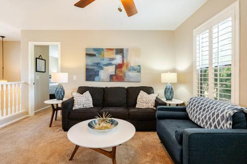 a living room with a couch and a table at Amazing Gilbert home 3 Bed 2 and half Bath sleeps 8 2 car garage in Gilbert