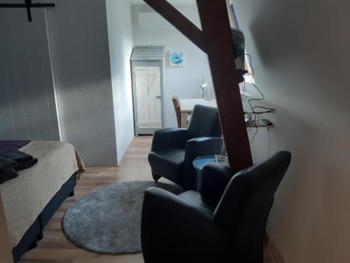 Χώρος καθιστικού στο B&B Bourgondisch Lomm