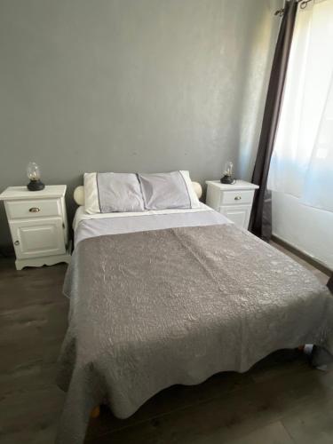 Un ou plusieurs lits dans un hébergement de l'établissement Casamea - 2 chambres, Proche Hôpital, WiFi, Clim