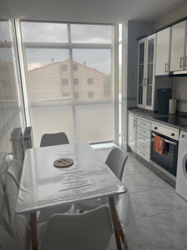 Kuchyň nebo kuchyňský kout v ubytování Destino Allariz