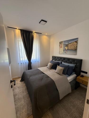 Postel nebo postele na pokoji v ubytování Bistrik Old Town Apartments Free Parking