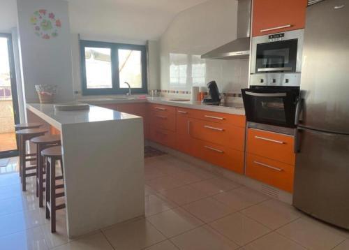 Kuchyň nebo kuchyňský kout v ubytování Apartamento Pedra do Timón