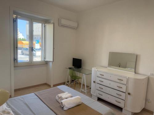 Postel nebo postele na pokoji v ubytování CasadiLollo