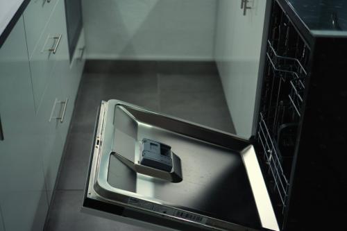 a microwave oven with a phone inside of it at Casa la Serrana in Yecla