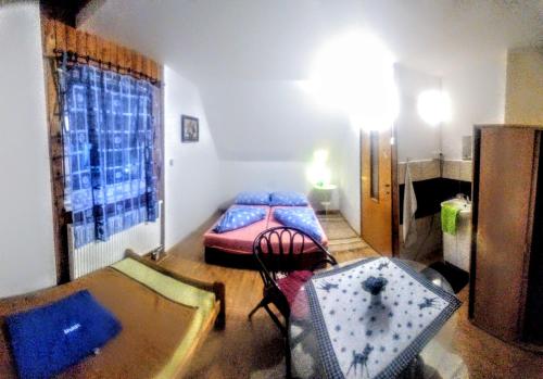 Postel nebo postele na pokoji v ubytování Chata Strbianka