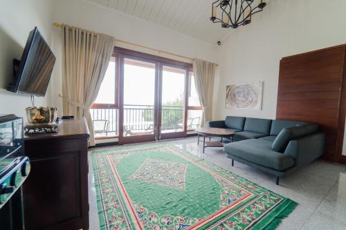 TV a/nebo společenská místnost v ubytování Panorama Sanad Resort