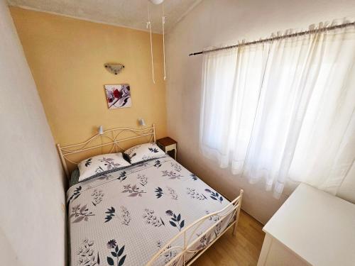 Postel nebo postele na pokoji v ubytování Apartments Carmen Vinisce