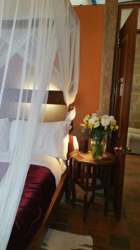 Ένα ή περισσότερα κρεβάτια σε δωμάτιο στο Woodmere Grand Hotel & Serviced Apartments