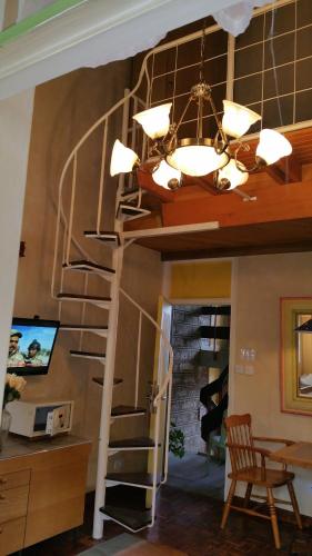 Μια τηλεόραση ή/και κέντρο ψυχαγωγίας στο Woodmere Grand Hotel & Serviced Apartments