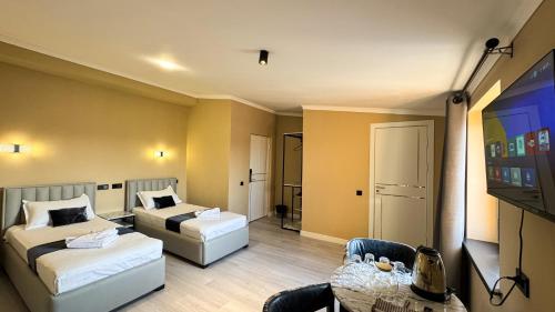TV a/nebo společenská místnost v ubytování Hotel S & D Hostel