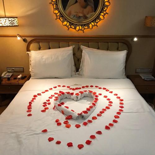 Ein Bett oder Betten in einem Zimmer der Unterkunft Opi Lalla hotel