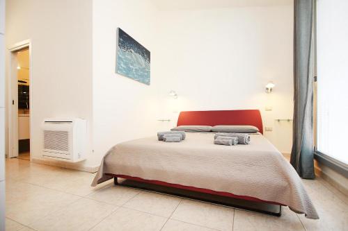 a bedroom with a large bed in a room at Villa Sa Marchesa in Solanas