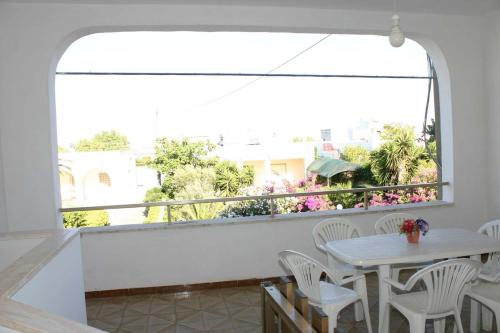 Balkón nebo terasa v ubytování Casa Davide a soli 100 mt dalla spiaggia di Torre Lapillo
