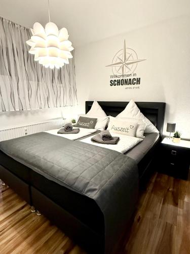 Кровать или кровати в номере Appartement zur Birke