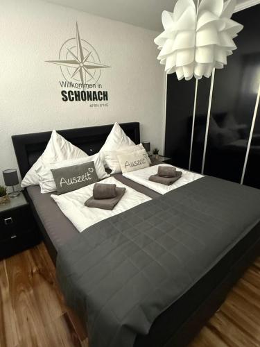 Кровать или кровати в номере Appartement zur Birke