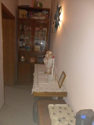 a room with a table with a tea pot on it at Vacanze da Susy Casa Silvana in Passignano sul Trasimeno