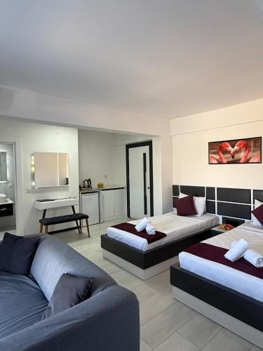 Ένα ή περισσότερα κρεβάτια σε δωμάτιο στο WB Weekend Otel
