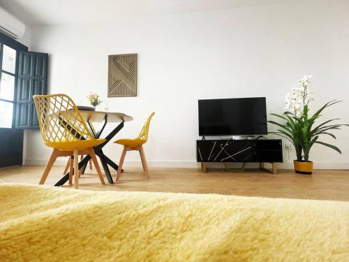 Μια τηλεόραση ή/και κέντρο ψυχαγωγίας στο Apartamento La Brisa, relax y naturaleza