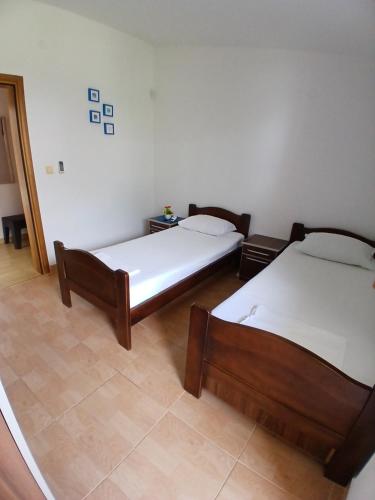 Apartmani Bisserにあるベッド