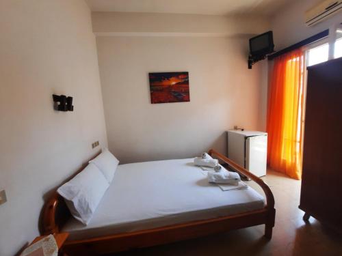 Кровать или кровати в номере Hotel Matina