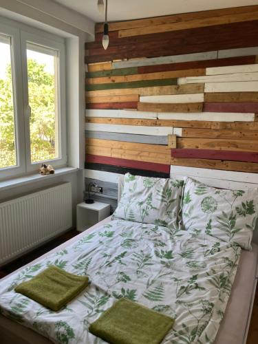 Posteľ alebo postele v izbe v ubytovaní designer fészek
