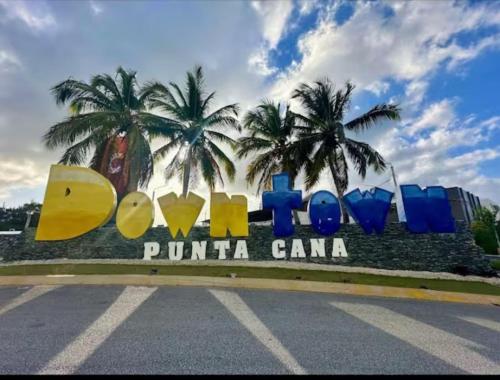 a sign for the pomona pomeria casino at Central Park Down Town F2 in Punta Cana