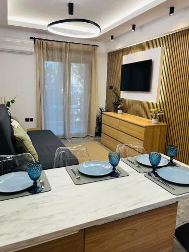 Телевизор и/или развлекательный центр в Avra House Nea Peramos