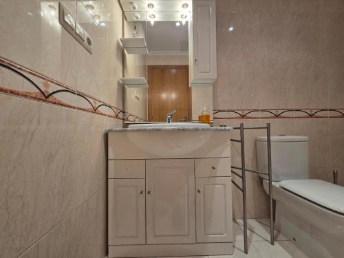 Ένα μπάνιο στο Apartamento Sanxenxo playa