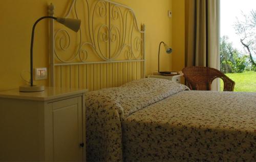Postel nebo postele na pokoji v ubytování B&B Lieti Colli