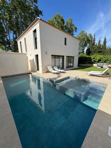 Villa neuve plage a pied