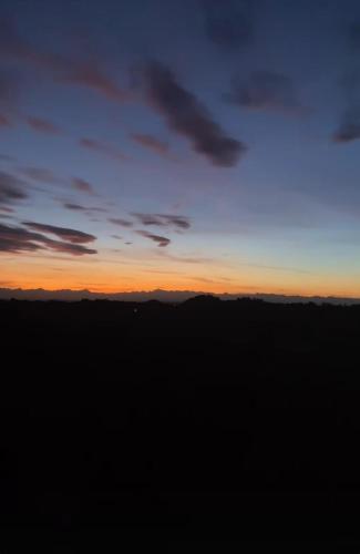 a sunset from the top of a mountain at B&B TERRA DI COLLINA in Montegrosso dʼAsti