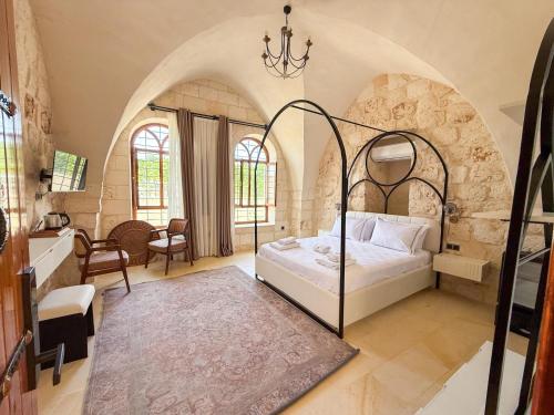 Postel nebo postele na pokoji v ubytování Zenobia Otel