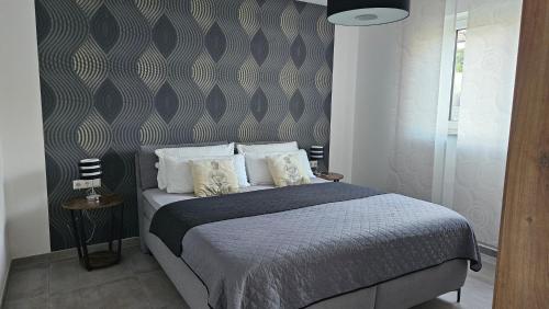 Postel nebo postele na pokoji v ubytování Ferienwohnung Hesselberg