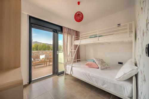 Katil atau katil-katil dalam bilik di Prasonisi Villas