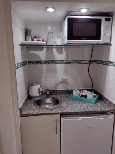 Køkken eller tekøkken på Departamento Corrientes Av.