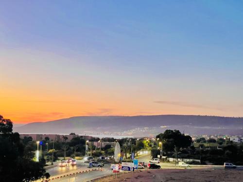 a view of a parking lot at sunset at Freebird Surfcamp Morocco in Agadir
